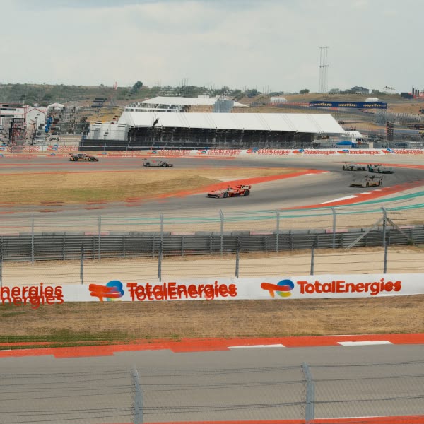 A race track with a sign that says Total Energies.