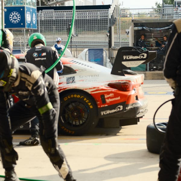 A red race car with the number 3 on the side.