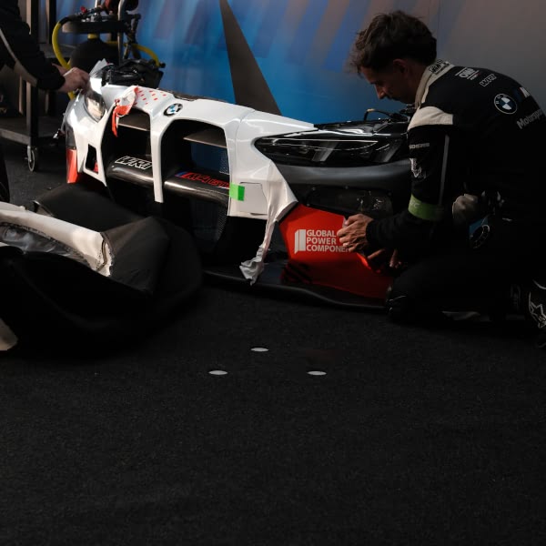 A man working on a car.