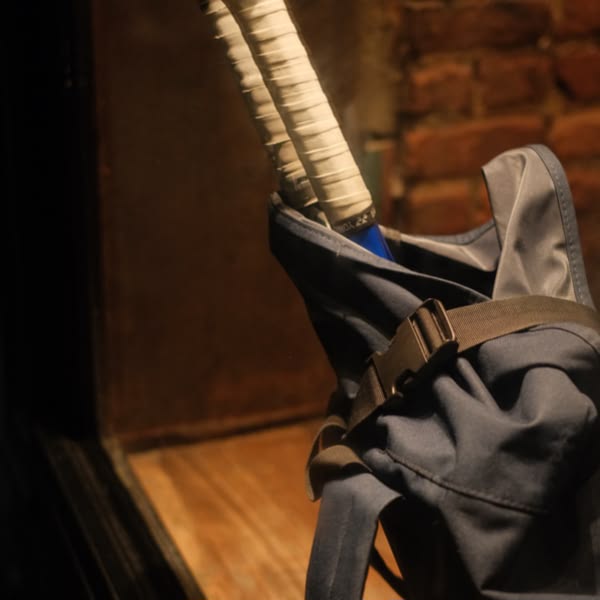 A blue umbrella with white stripes.