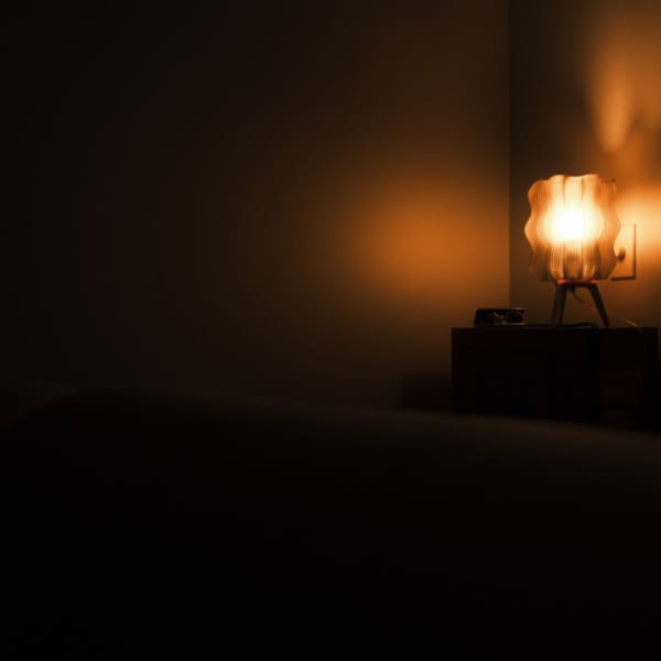 A lamp on a table.