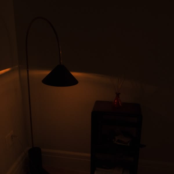 A lamp on a table.