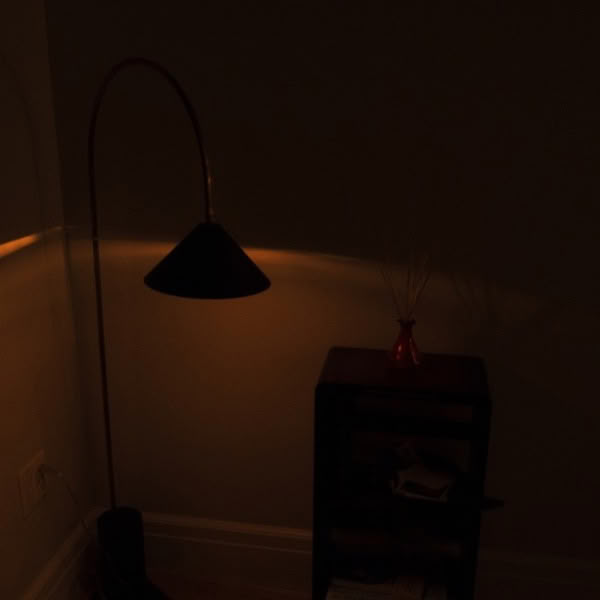 A lamp on a table.