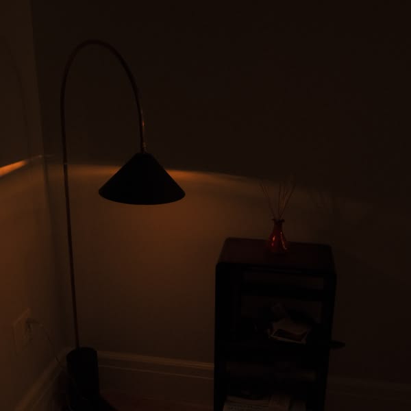A lamp on a table.