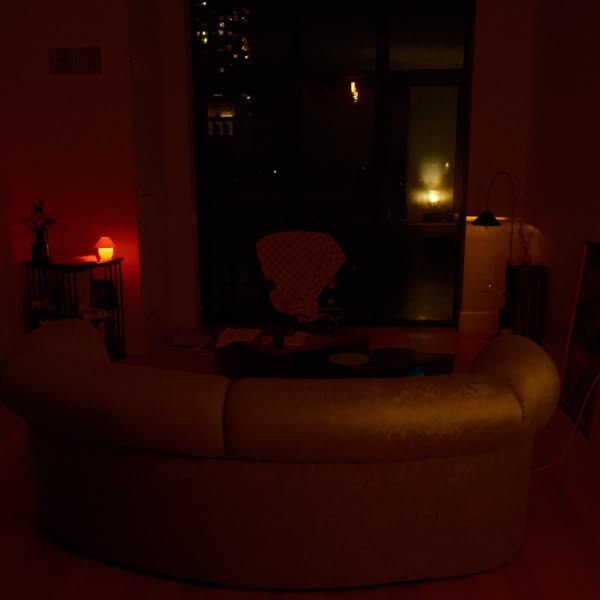A white couch in a living room.