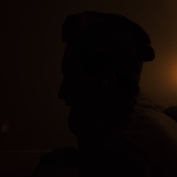 A man wearing a hat.