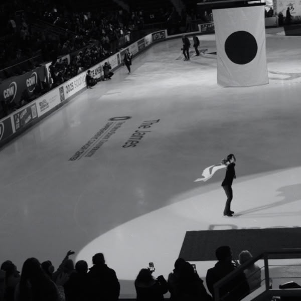 A woman skating on ice.