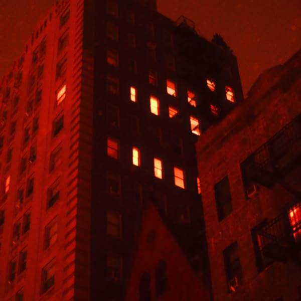 A tall building with many windows.