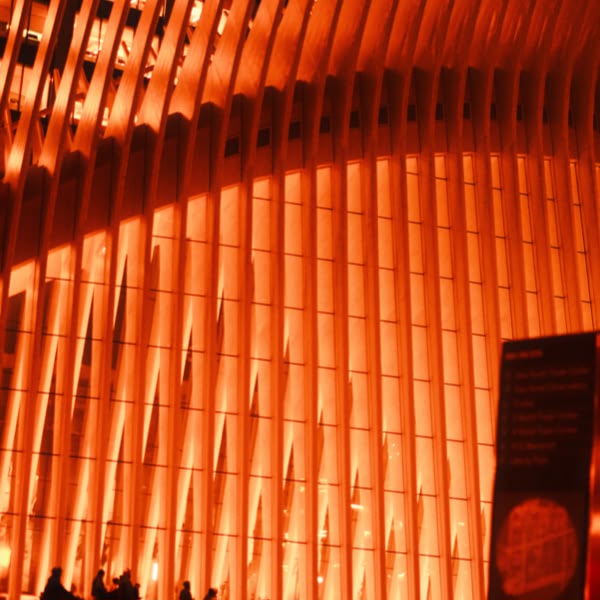 A large building with a curved structure.