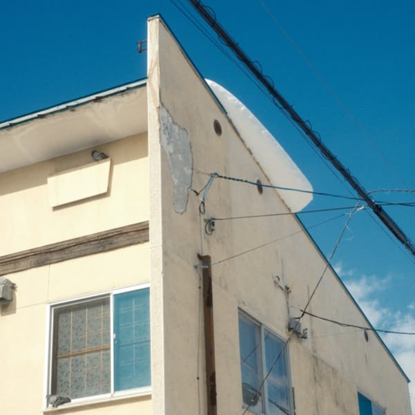 A white building with a window.