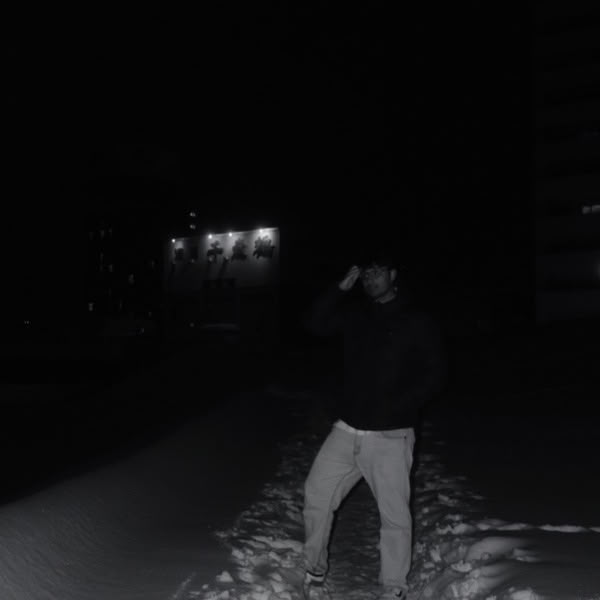 A man standing in the snow.
