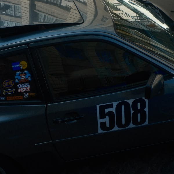 A car with the number 508 on the side.