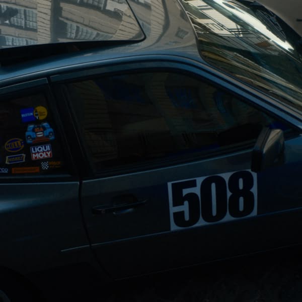 A car with the number 508 on the side.