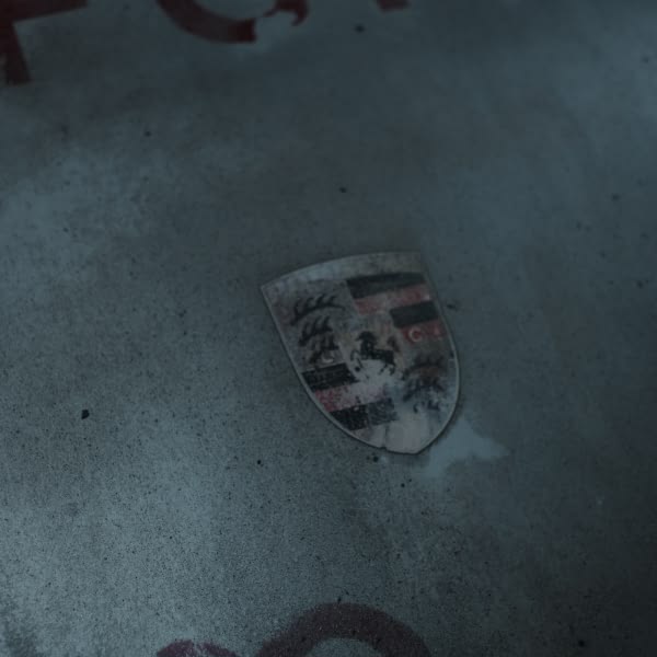 A coat of arms with a red cross on it.