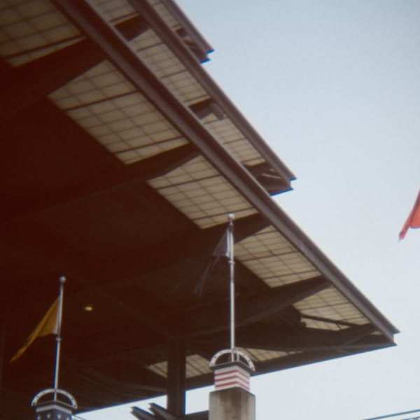 A building with a flag on the roof.