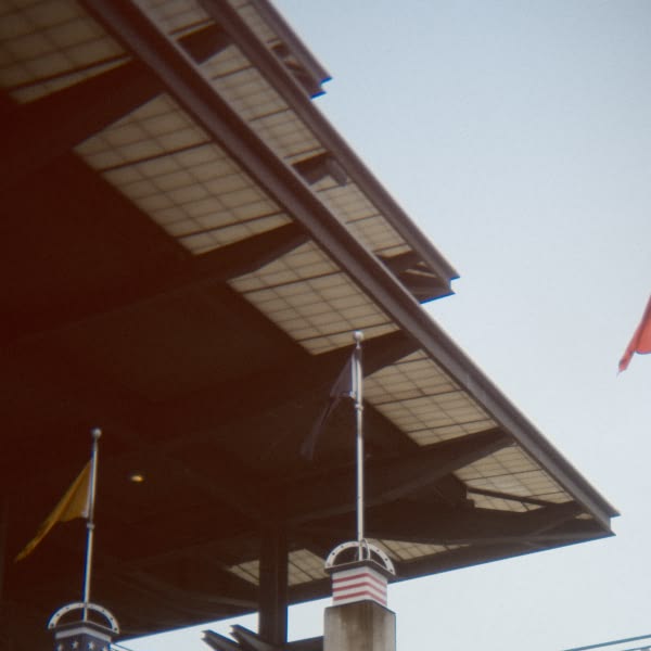 A building with a flag on the roof.
