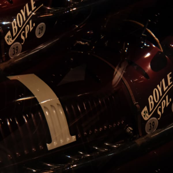 A red and white motorcycle with the number 39 on it.